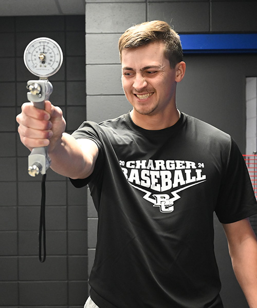 Male student practicing grip strength